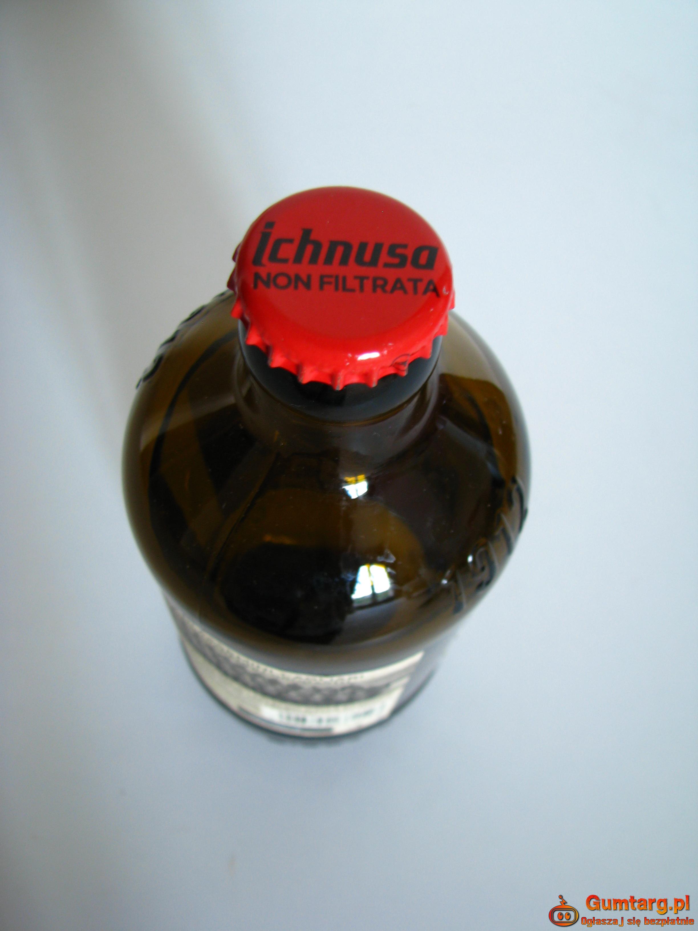 Butelka po włoskim piwie Ichnusa z kapslem